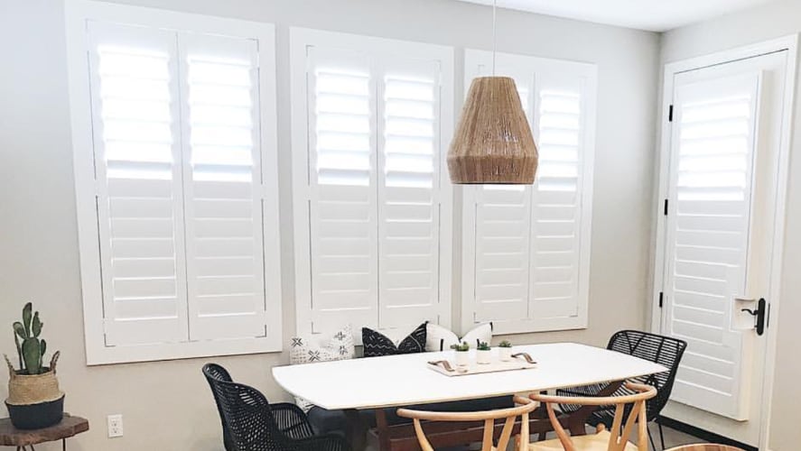 Plantation shutters in a dining room